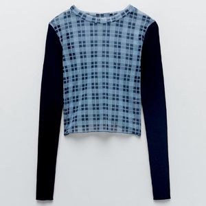 Zara’s combination knit sweater